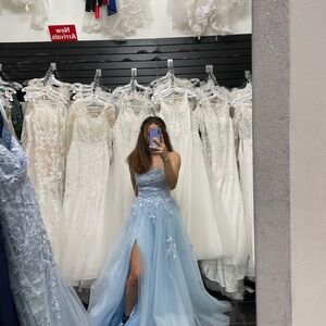 Elegant Light Blue Gown with Floral Details